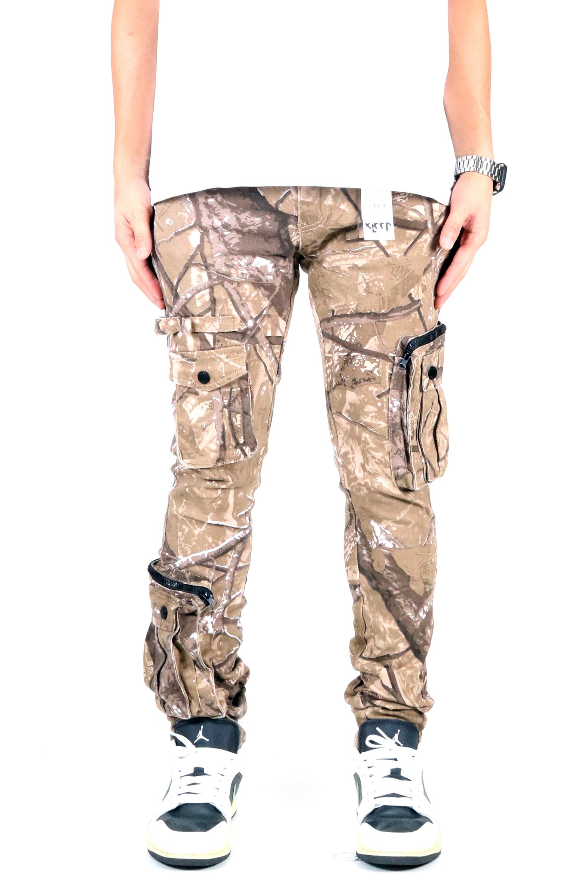 Front view of the brown and green camo cargo pants with cargo pockets.