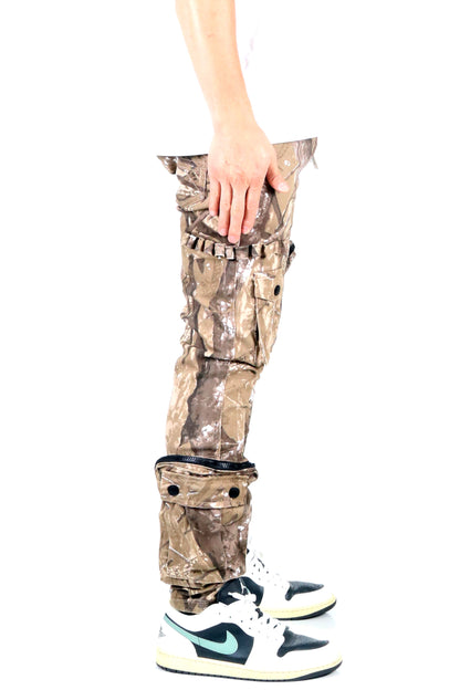 Side view of the brown and green camo cargo pants showcasing a skinny fit.