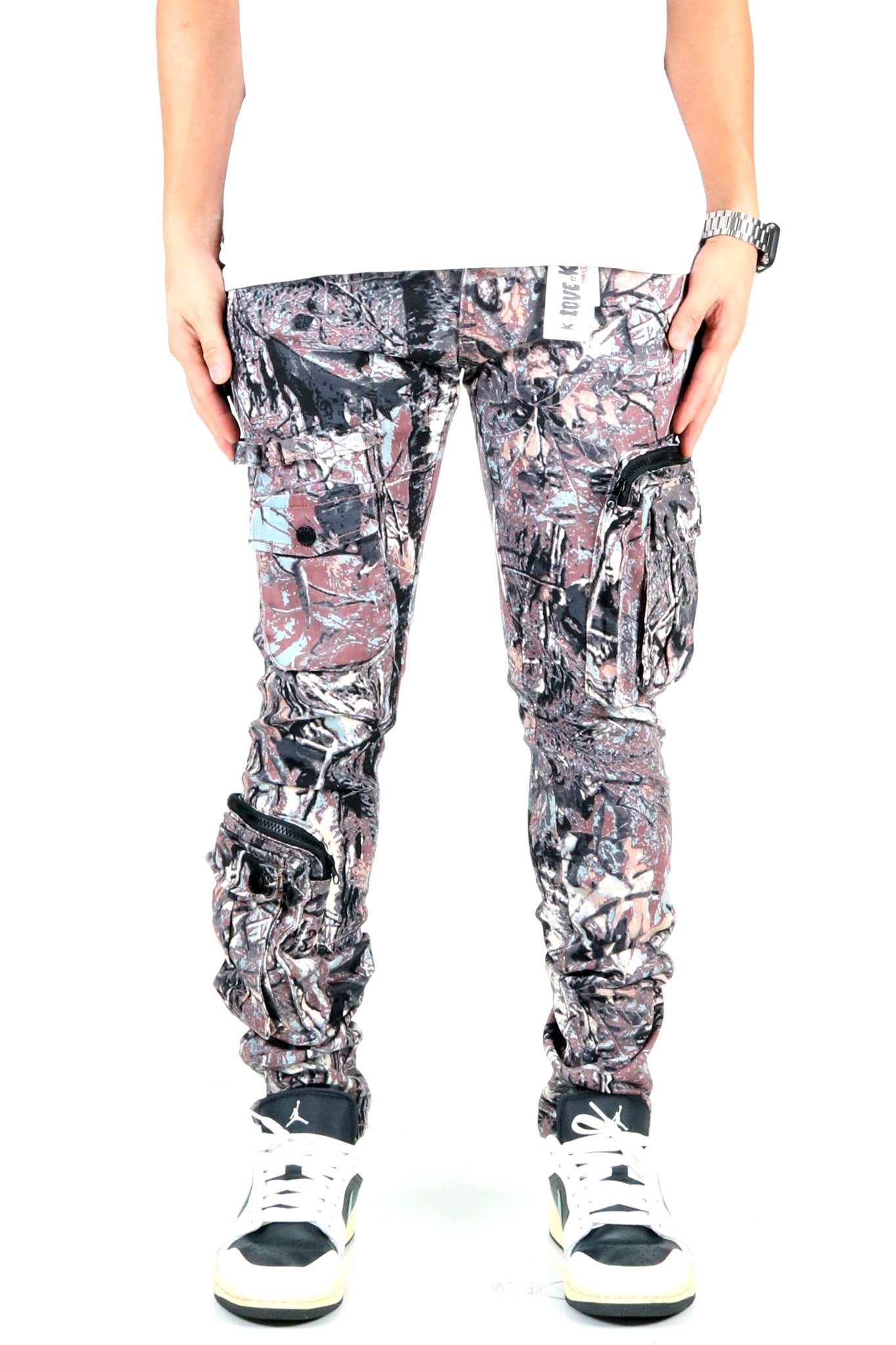 Front view of the forest camo cargo pants featuring cargo pockets.