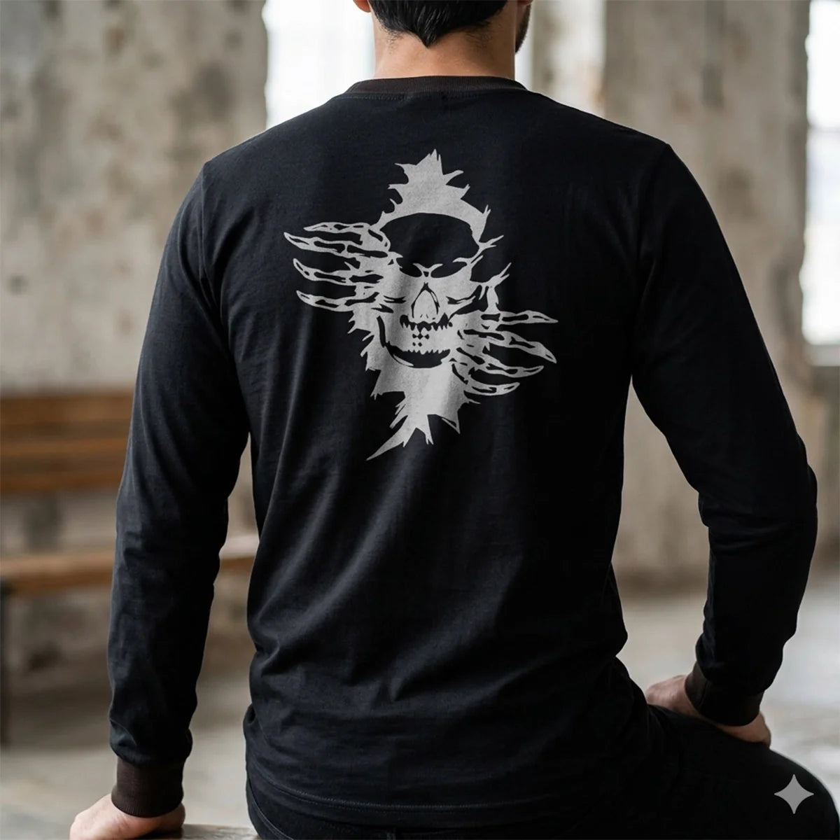 Lifestyle shot of the black long sleeve shirt highlighting the graphic design on the back.