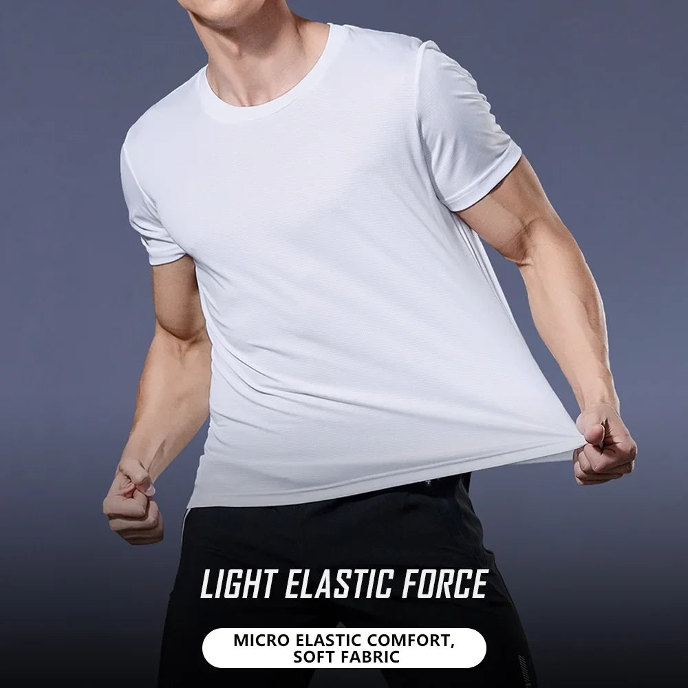Lifestyle shot of a man wearing a white t-shirt in a casual fit.