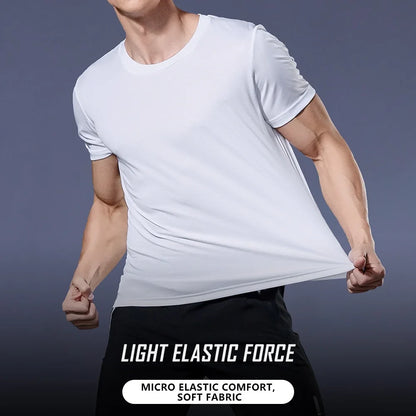 Lifestyle shot of a man wearing a white t-shirt in a casual fit.