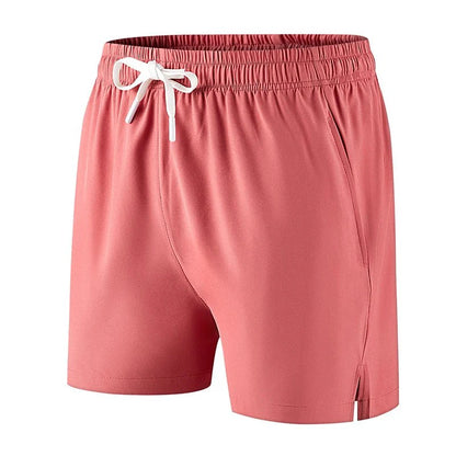 Front view of pink running shorts featuring an elastic waistband and drawstring closure.