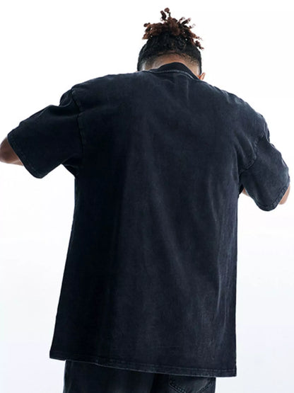 Back view of the oversized graphic t-shirt in black.