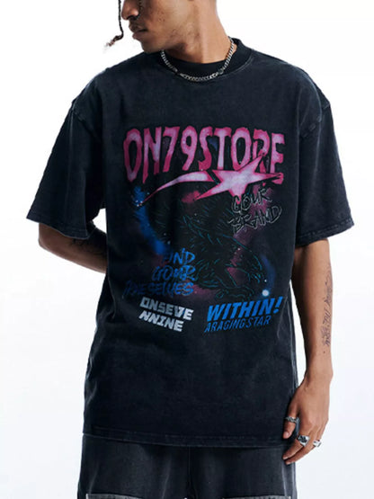 Front view of the oversized graphic t-shirt in black with pink and blue print.