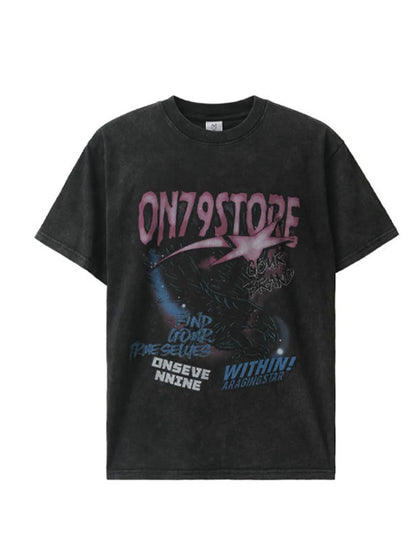 Front view of the oversized graphic t-shirt in black with pink and blue print.