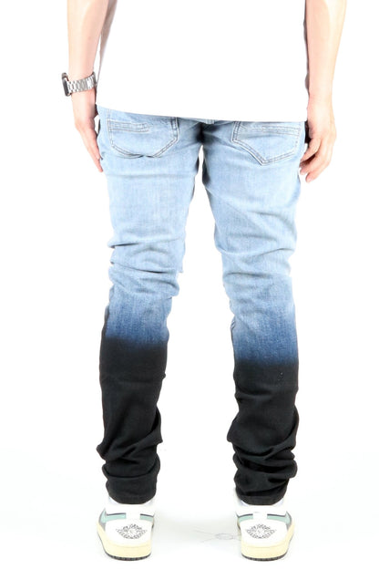 Back view of the heavy washed skinny denim pants highlighting the ombre design.