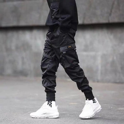 Black cargo pants with cargo pockets, lifestyle shot.