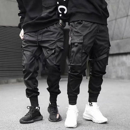 Black cargo pants with cargo pockets, lifestyle view.