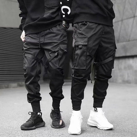 Black cargo pants with cargo pockets, lifestyle view.