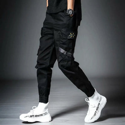 Military Techwear Pants side view with a drawstring waist and multiple pockets.