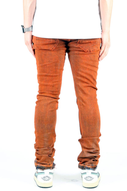 Back view of the vintage olive skinny denim pants highlighting the unique repair effect.