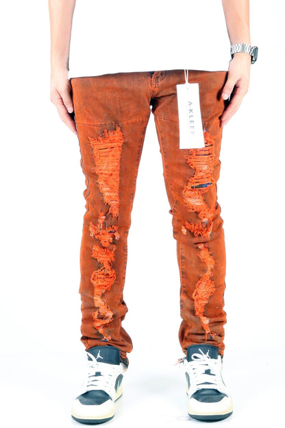 Front view of the vintage olive skinny denim pants with distressed details.