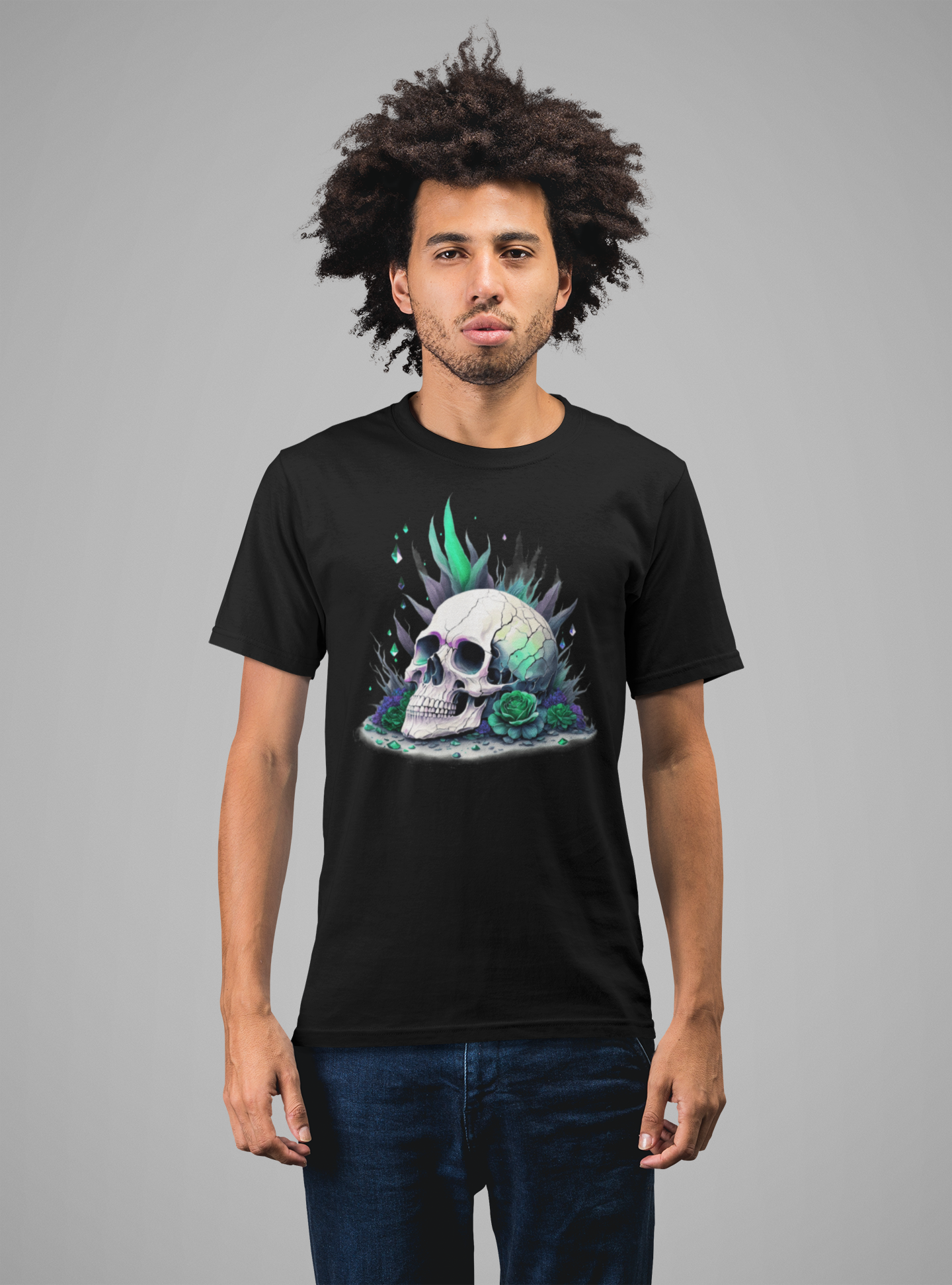 Fitted neon skull graphic tee in black and green, lifestyle shot of a young man with afro.