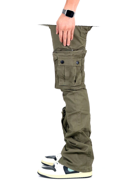 Side view of olive cargo pants with hand inside pocket and cargo style.