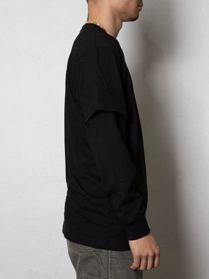 Side view of the black long sleeve t-shirt with a simple design.