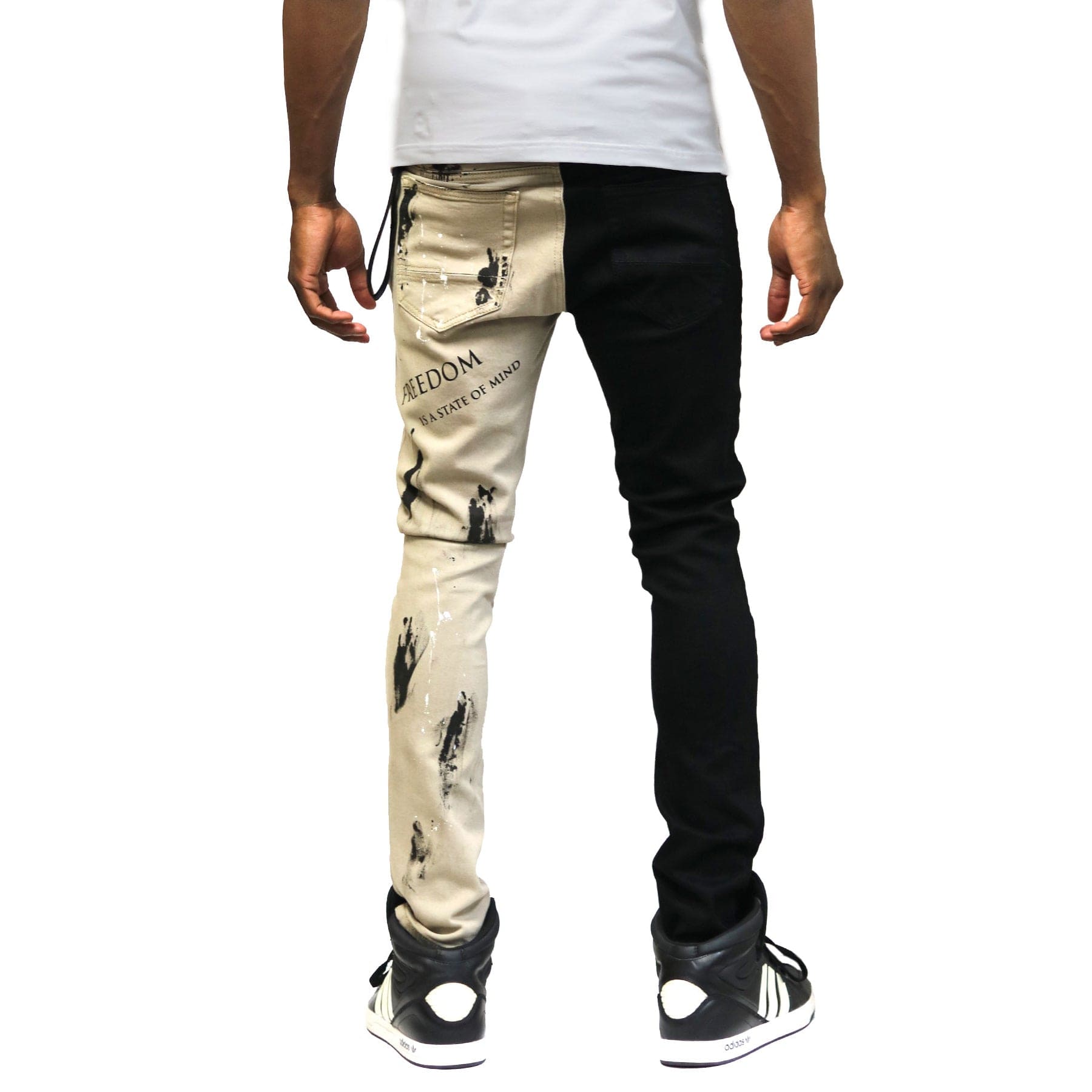 Back view of the half black and half khaki skinny twill pants.