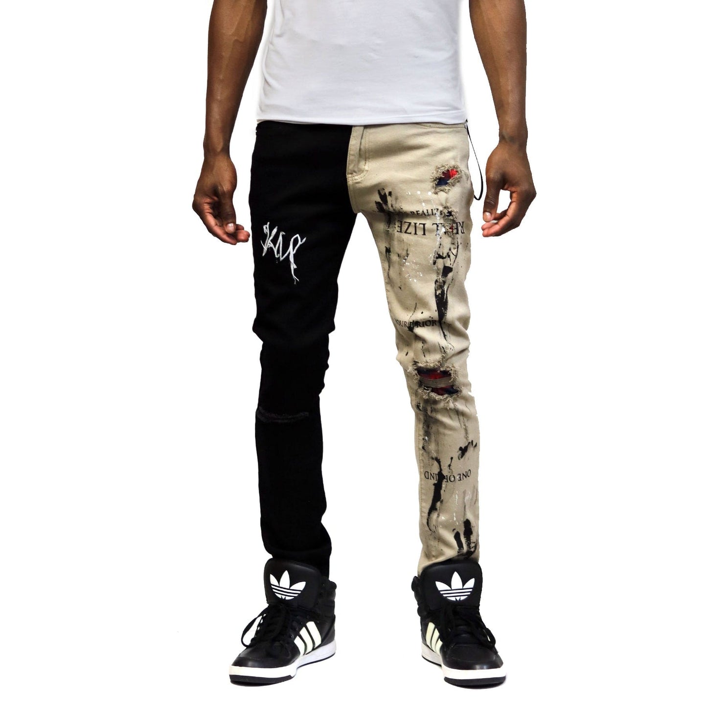 Front view of the half black and half khaki skinny twill pants.
