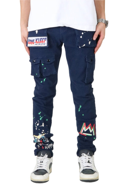 Front view of the blue skinny twill cargo pants with 3D puff pockets.