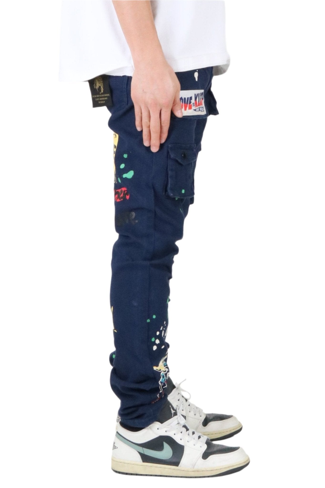 Side view of the blue skinny twill cargo pants highlighting the skinny fit.