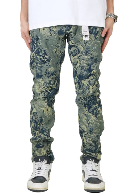Front view of the green and blue jacquard slim fit denim pants with pocket details.