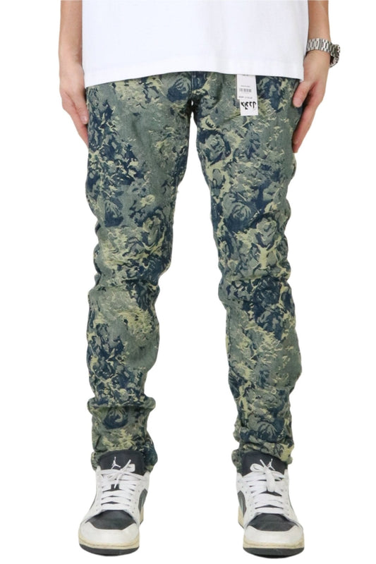 Front view of the green and blue jacquard slim fit denim pants with pocket details.