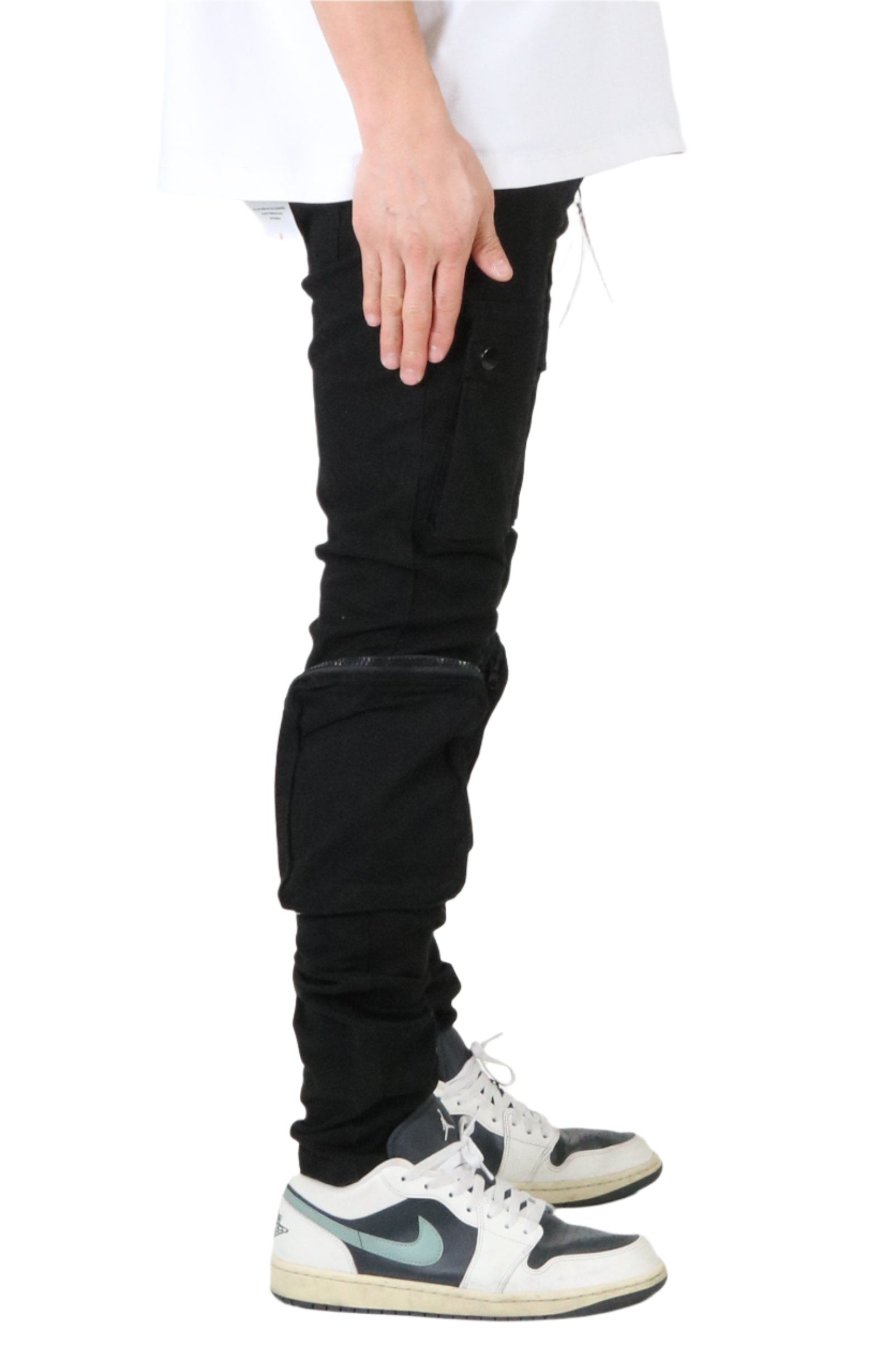 Front view of the black cargo pants with cargo pockets.