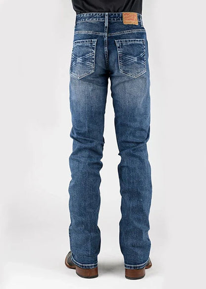 Back view of blue jeans showcasing pocket details and faded design.
