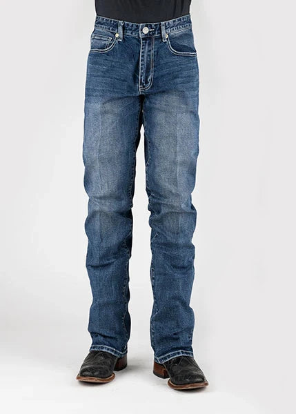 Front view of blue jeans with a faded design and straight leg.