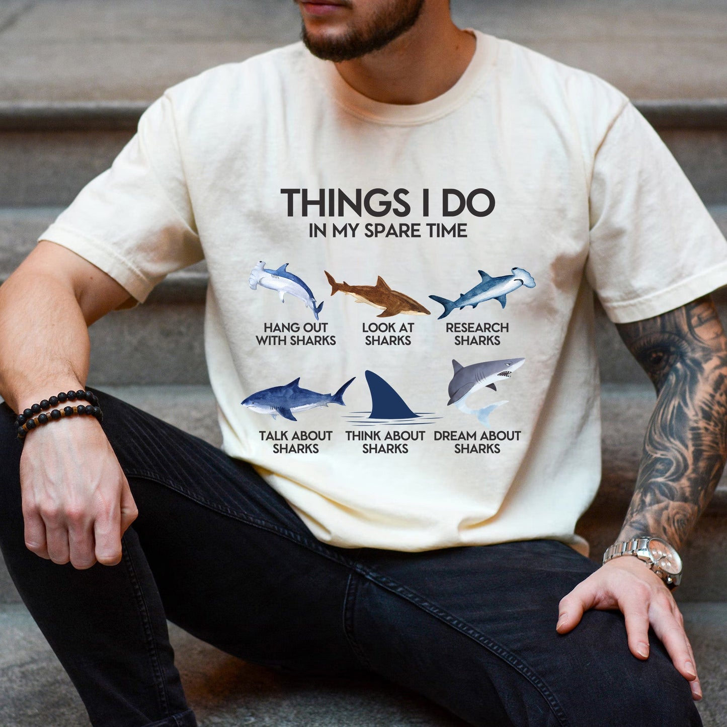 Cream Shark T-Shirt lifestyle shot featuring shark graphics.