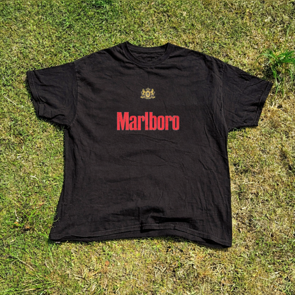 Front view of a black t-shirt with text print and a plain design.